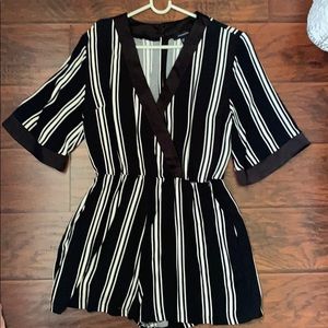A black abs white striped romper